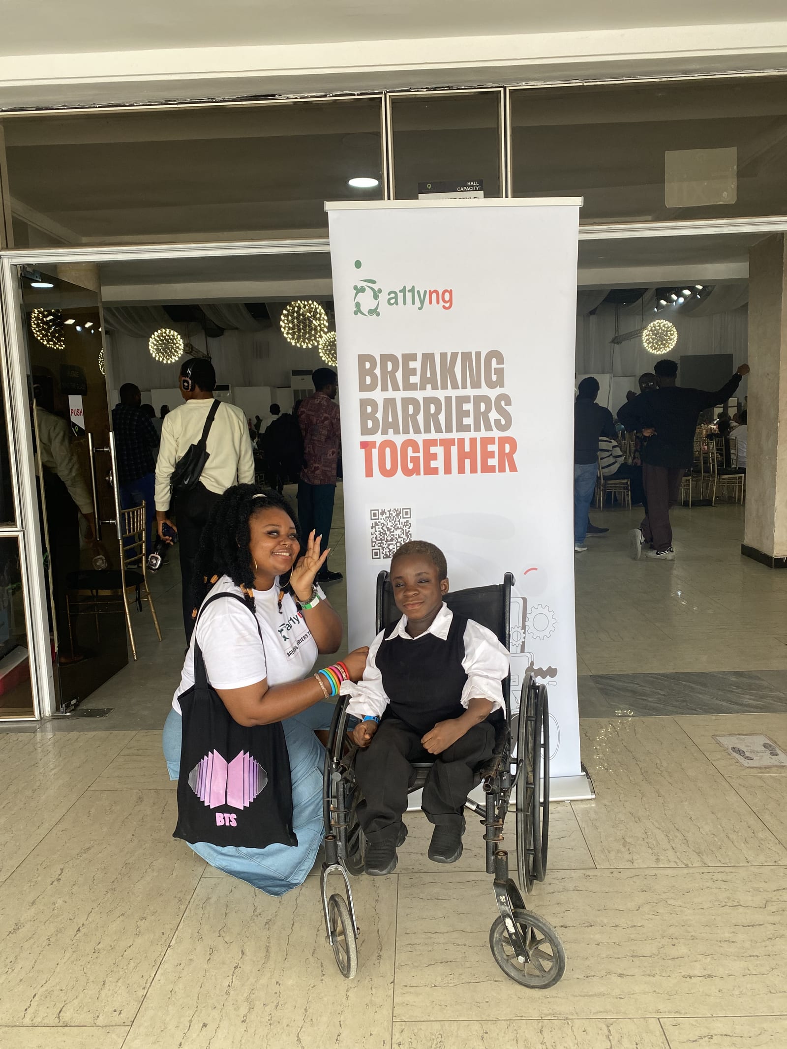 Accessibility Nigeria team member with community partner at Breaking Barriers Together event